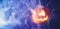 Spooky Halloween jack o lantern pumpkin with carved scary face glowing and billowing smoke in the night