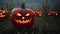 Spooky Halloween jack-o-lanterns in cornfield