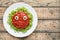 Spooky halloween monster green pasta with fake blood tomato sauce and mozzarella eyeballs