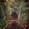 Spooky misty abandoned railway tunnel