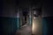 Spooky terrible dark corridor in old ruined hospital, perspective