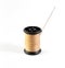 Spool of brown thread and needle