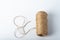 Spool rope on white background. Isolated. Embroidery thread yarn isolated, wool knitting