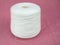 A spool of white yarn for knitting, soft acrylic.