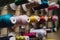 Spools of thread hanging in a tailor shop. Skeins for sewing machine hang in a sewing shop