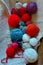 Spools of wool thread for weaving, colorful threads. Knitting background, a lot of balls. Knitting yarn for handmade winter