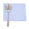 Spoon on blue napkin