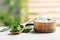 Spoon and bowl with pieces of aloe vera