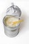Spoon in can full of powdered baby milk formula isolated on whit