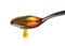 Spoon filled with honey