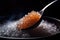 A spoon filled with sugar is placed delicately on top of a mound of sugar, creating a sweet and enticing image, Close-up depiction