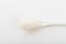 Spoon of fine granulated sugar  on white  - Image