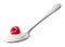 Spoon of fresh greek yogurt and raspberry on white background