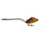 Spoon full of ground flaxseed with white background