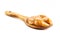 Spoon with homemade dulce de leche, condensed cream or pasty caramel, isolated white background , Brazillian tipical food