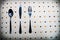 Spoon Knife and a Fork organized ina dottef background textile table