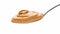 Spoon of peanut paste