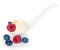 Spoon of raspberries and blueberries yogurt