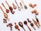 Spoon of various legumes and different kinds of nuts walnuts kernels ,hazelnuts, almond kernels,brown pinto ,red kidney beans and