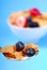 Spoonful of bran flakes with fruit