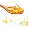 Spoonful of gel capsules of omega 3. Close up capsules fish oil