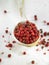 Spoonful of pink peppercorns
