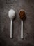 Spoons with coffee and sugar on the kitchen counter