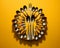 spoons and forks arranged in a circle on a yellow background