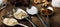 Spoons with sugar, coffee, oats and meringue, chocolate marshmallow, honey and nuts on a real brown wooden table.