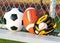 Sport balls. Soccer ball, american football and baseball