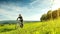 Sport bike woman in a beautiful meadow, fabulous scenery