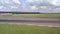 Sport car drifting on speed track aerial view. Japanese car drifting on turn