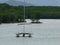 Sport catamaran, anchoring off the coast with jungle