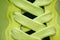 Sport concept, shoe close up, wellness concept, yellow lace on blue sneakers close up. Detail of yellow shoe on running shoes.