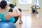 Sport concept - young sporty woman doing exercises on bosu ball