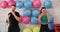 Sport couple man and woman training gym aerobics on fitness ball background. Fitness man and woman doing aerobics