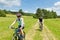 Sport couple riding mountain bicycles in