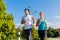 Sport couple running and jogging on rural street