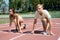 Sport couple start competition running at arena track