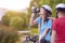 Sport and cycling Concept: Young Caucasian Cyclist Resting Toget