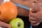 Sport and diet. Attractive man with muscular body. Athletic guy and fruits
