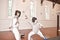 Sport, fight and men with fencing sword in training, exercise or workout in a hall. Martial arts, match and fencers or