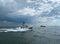 Sport Fishing Boat Returning to Port Under a Stormy Sky