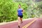 Sport and fitness runner man running on road