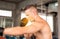 Sport handsome man boxer punching at a boxing gym,Men boxer eye looking training on punching bag