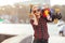 Sport happy girl posing in summer with skateboard. Stylish lucky hipster woman with colorful longboard in sunset in