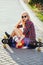 Sport happy girl posing in summer with skateboard. Stylish lucky hipster woman with colorful longboard in sunset in