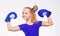 Sport and health concept. Boxing sport for female. Be strong. Girl child with blue gloves posing on white background