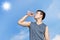 Sport and healthy concept : Thirsty athlete drinking water after