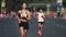 Sport jogging marathon. Female jogger running. Woman athlete. Motivation concept